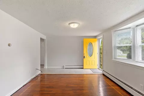 Living - 186 Burnham Rd, Lowell, MA 01852 photo 2 of 3