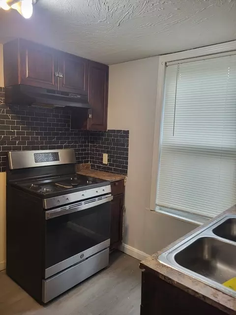Kitchen - 89 Oak St, Fall River, MA 02720 photo 4 of 5