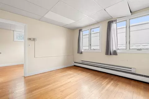 Living - 1205 Massachusetts Ave, Arlington, MA 02476 photo 2 of 8