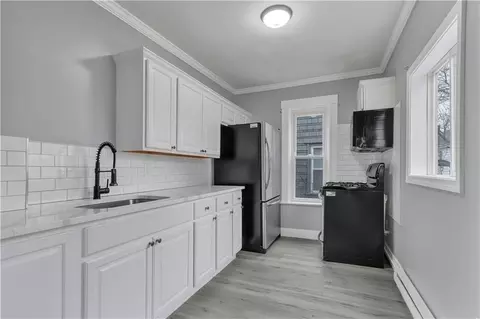 Kitchen - 420 Rathbun St, Woonsocket, RI 02895 photo 2 of 2
