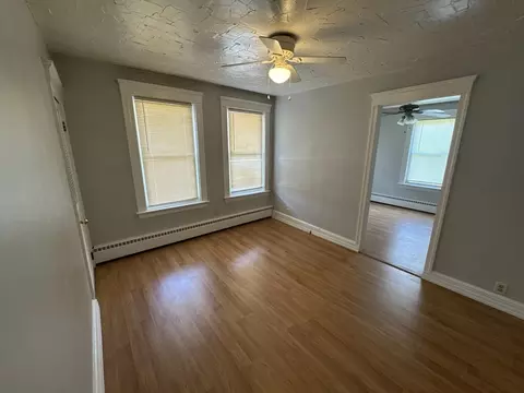 Living - 59 Cooper Ave, Woonsocket, RI 02895 photo 1 of 4