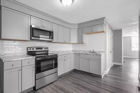 Kitchen - 50-52 Willow St, Lowell, MA 01852 photo 2 of 3