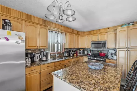 Kitchen - 31 Sachem St, Fall River, MA 02724 photo 2 of 3