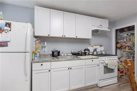 Kitchen - 411 Rathbun St, Woonsocket, RI 02895 photo 1 of 1