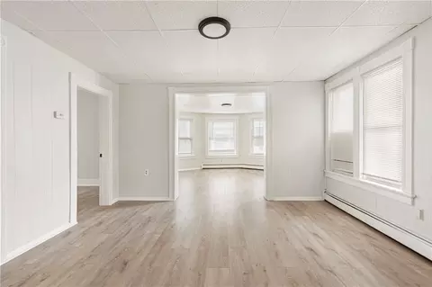 Living - 411 Rathbun St, Woonsocket, RI 02895 photo 7 of 16
