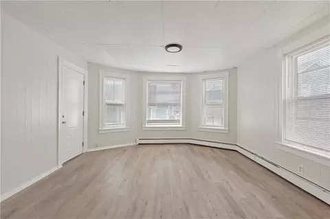 Living - 411 Rathbun St, Woonsocket, RI 02895 photo 1 of 16