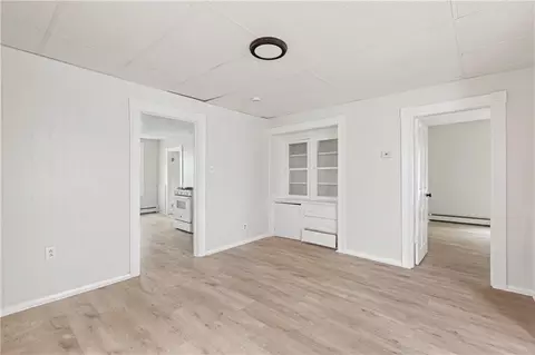 Living - 411 Rathbun St, Woonsocket, RI 02895 photo 5 of 16