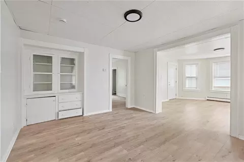 Living - 411 Rathbun St, Woonsocket, RI 02895 photo 6 of 16