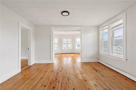 Living - 411 Rathbun St, Woonsocket, RI 02895 photo 15 of 16