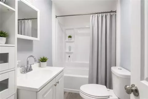 Bath - 411 Rathbun St, Woonsocket, RI 02895 photo 1 of 2