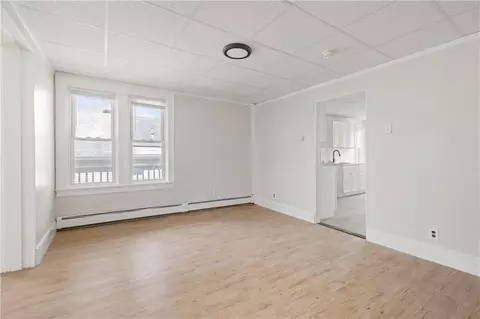 Living - 411 Rathbun St, Woonsocket, RI 02895 photo 13 of 16