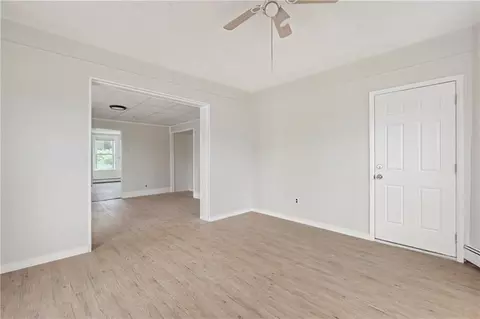 Living - 411 Rathbun St, Woonsocket, RI 02895 photo 8 of 16