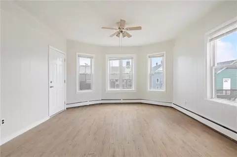 Living - 411 Rathbun St, Woonsocket, RI 02895 photo 10 of 16