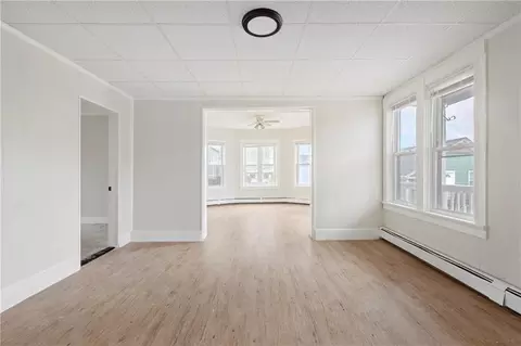 Living - 411 Rathbun St, Woonsocket, RI 02895 photo 14 of 16