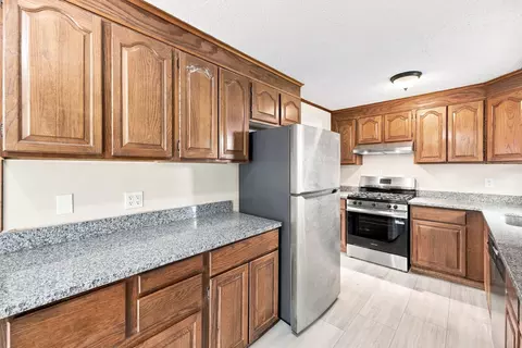 Kitchen - 76 Daley St, Chicopee, MA 01013 photo 5 of 7