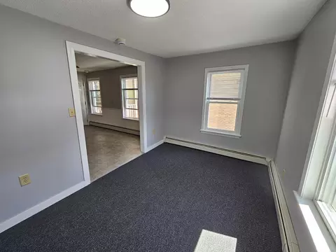 Living - 558 E School St, Woonsocket, RI 02895 photo 4 of 4