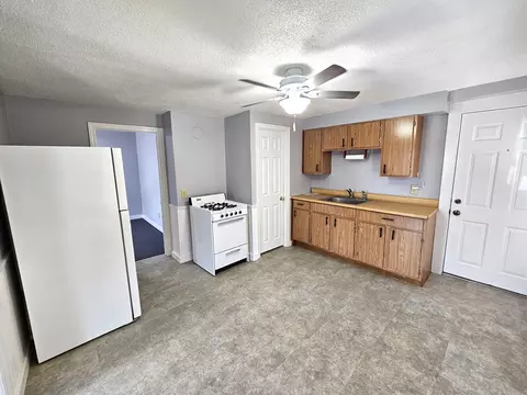 Kitchen - 558 E School St, Woonsocket, RI 02895 photo 2 of 9