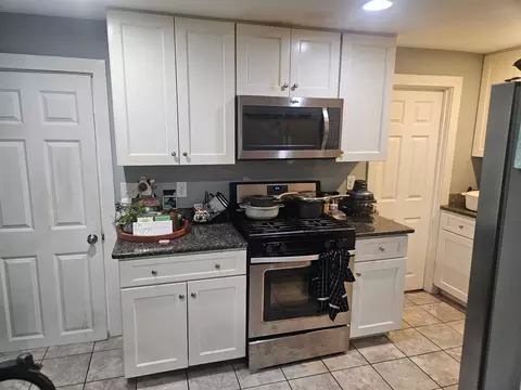 Kitchen - 205 Stackpole St, Lowell, MA 01852 photo 1 of 6