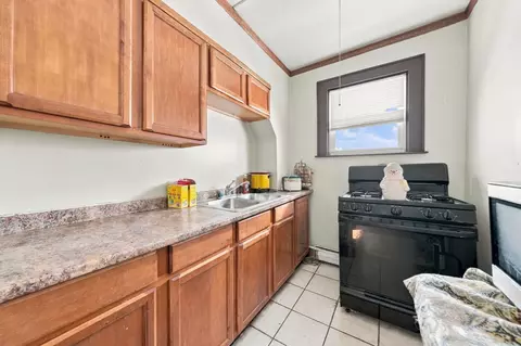 Kitchen - 97 Canonicus St, Fall River, MA 02723 photo 3 of 3