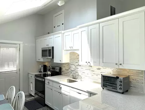 Kitchen - 10 Wharf Ave, Mashpee, MA 02649 photo 2 of 3