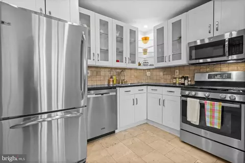 Kitchen - 3301 NW Dent Pl NW, Washington, DC 20007 photo 2 of 3