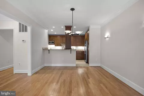 Living - 3203 Sutton Pl NW #C, Washington, DC 20016 photo 7 of 10