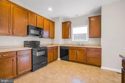 Kitchen - 157 Lexington Pl, Dover, DE 19901 photo 1 of 2