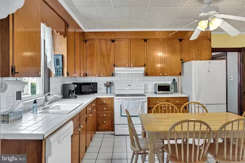 Kitchen - 207 Commerce St, Harrington, DE 19952 photo 2 of 3