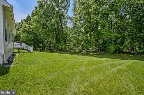 Exterior - 56 Springmill Dr, Middletown, DE 19709 photo 3 of 4