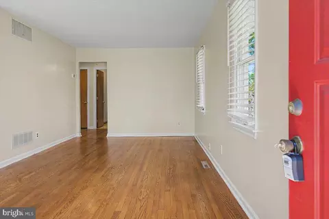 Living - 65 E Netherfield Rd, Wilmington, DE 19804 photo 1 of 4