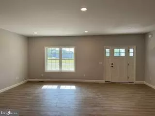 Living - 32781 Tussock Dr, Laurel, DE 19956 photo 1 of 2