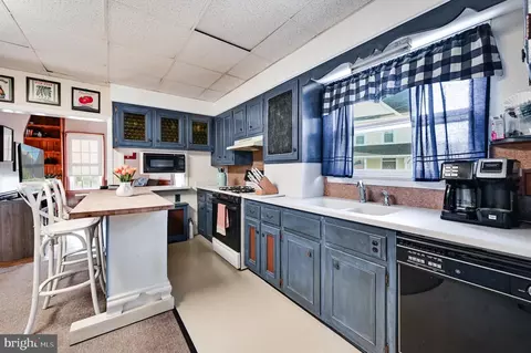 Kitchen - 230 E Market St, Laurel, DE 19956 photo 1 of 2
