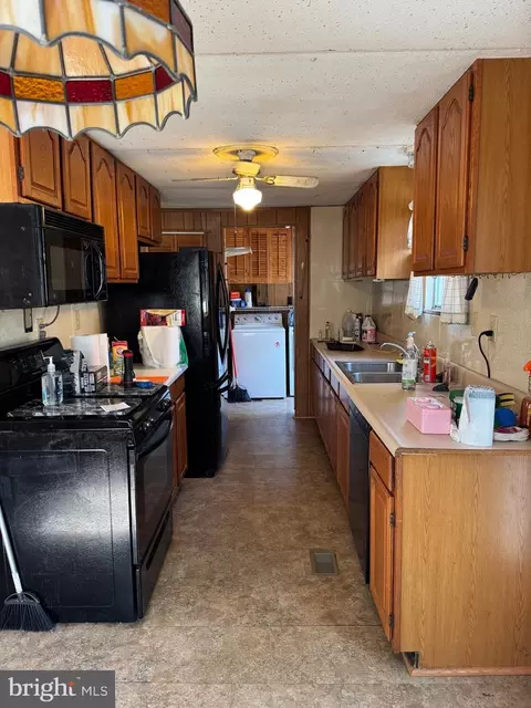 Kitchen - 22591 Cedar Ln, Georgetown, DE 19947 photo 1 of 2
