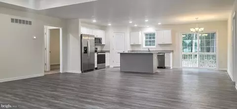 Living - 32733 Tussock Dr, Laurel, DE 19956 photo 1 of 2