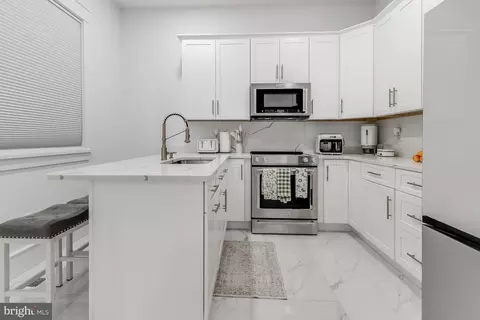 Kitchen - 20157 W Piney Grove Rd, Georgetown, DE 19947 photo 9 of 13