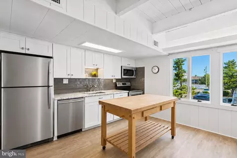 Kitchen - 97 Central Blvd # E, Bethany Beach, DE 19930 photo 2 of 2