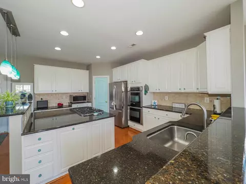Kitchen - 7707 Lyman Ave, Pasadena, MD 21122 photo 7 of 9