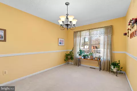 Living - 8390 Armstrong Dr, Pasadena, MD 21122 photo 3 of 7