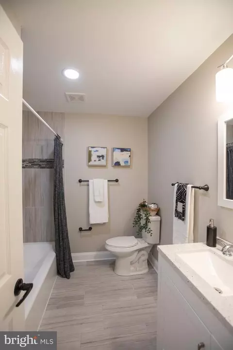Bath - 1919 Hilltop Rd, Pasadena, MD 21122 photo 2 of 10