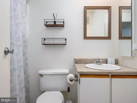 Bath - 8046 Abbey Ct #D, Pasadena, MD 21122 photo 1 of 2