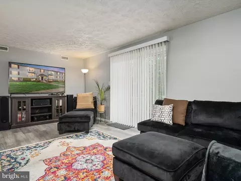Living - 8046 Abbey Ct #D, Pasadena, MD 21122 photo 2 of 2