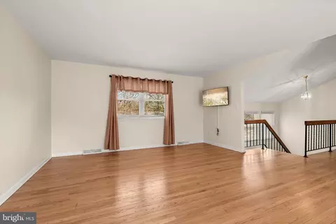 Living - 554 Cardinal Dr, Pasadena, MD 21122 photo 7 of 10