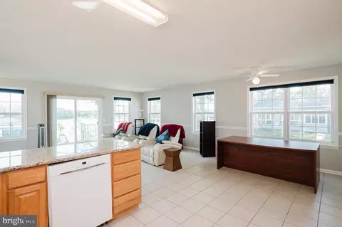 Living - 7618 Beach Dr, Pasadena, MD 21122 photo 2 of 5