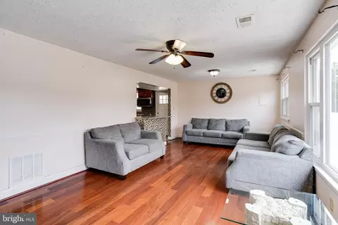 Living - 7704 Princess Pl, Pasadena, MD 21122 photo 2 of 11