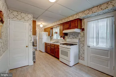 Kitchen - 8589 Bay Rd, Pasadena, MD 21122 photo 2 of 2