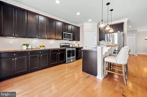 Kitchen - 7913 Charles Ct, Pasadena, MD 21122 photo 2 of 2