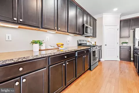 Kitchen - 7913 Charles Ct, Pasadena, MD 21122 photo 1 of 2