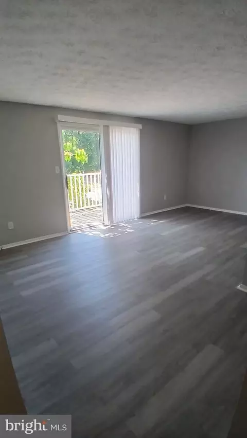 Living - 8040 K Abbey Ct #K, Pasadena, MD 21122 photo 1 of 2