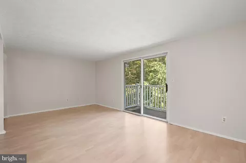 Living - 8046 E Abbey Ct #8046E, Pasadena, MD 21122 photo 2 of 4