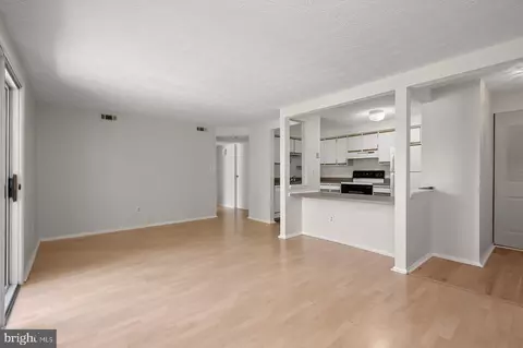 Living - 8046 E Abbey Ct #8046E, Pasadena, MD 21122 photo 3 of 4